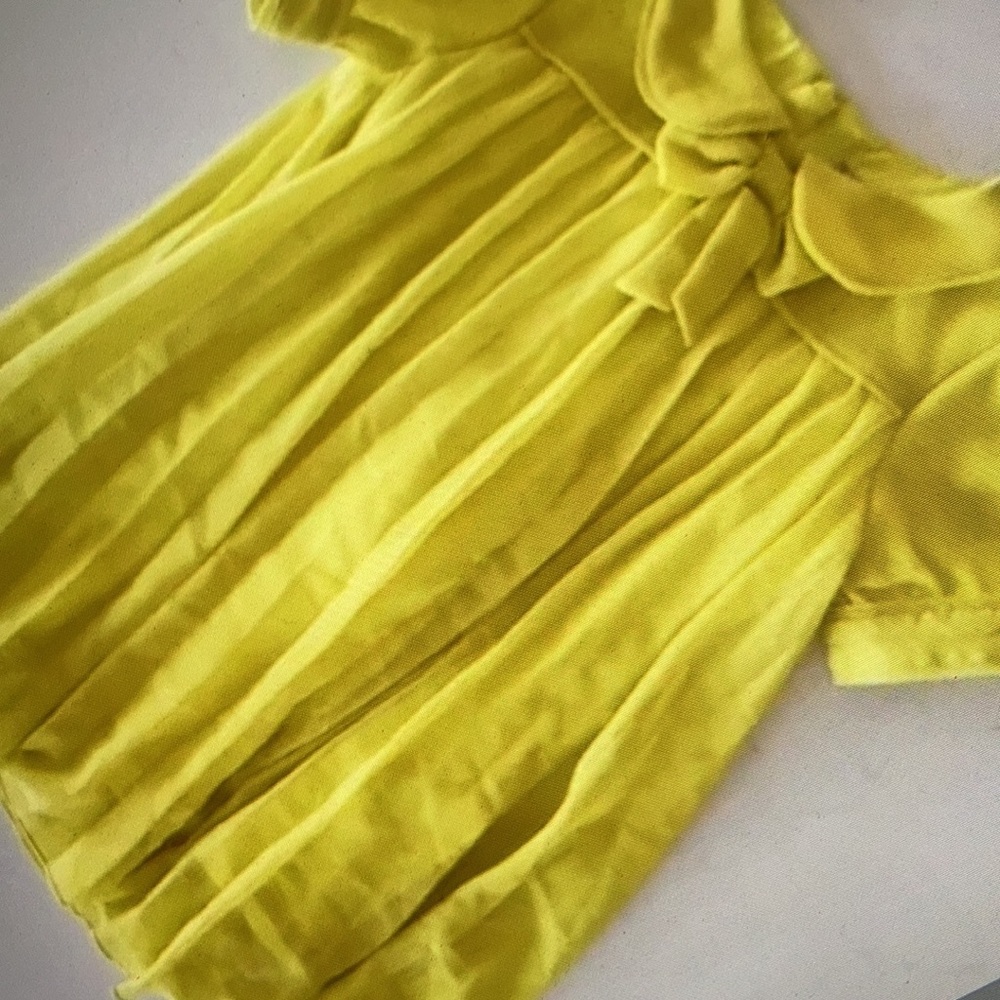 Stunning bright layer accordion style blouse